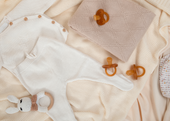 baby pacifiers and clothes 